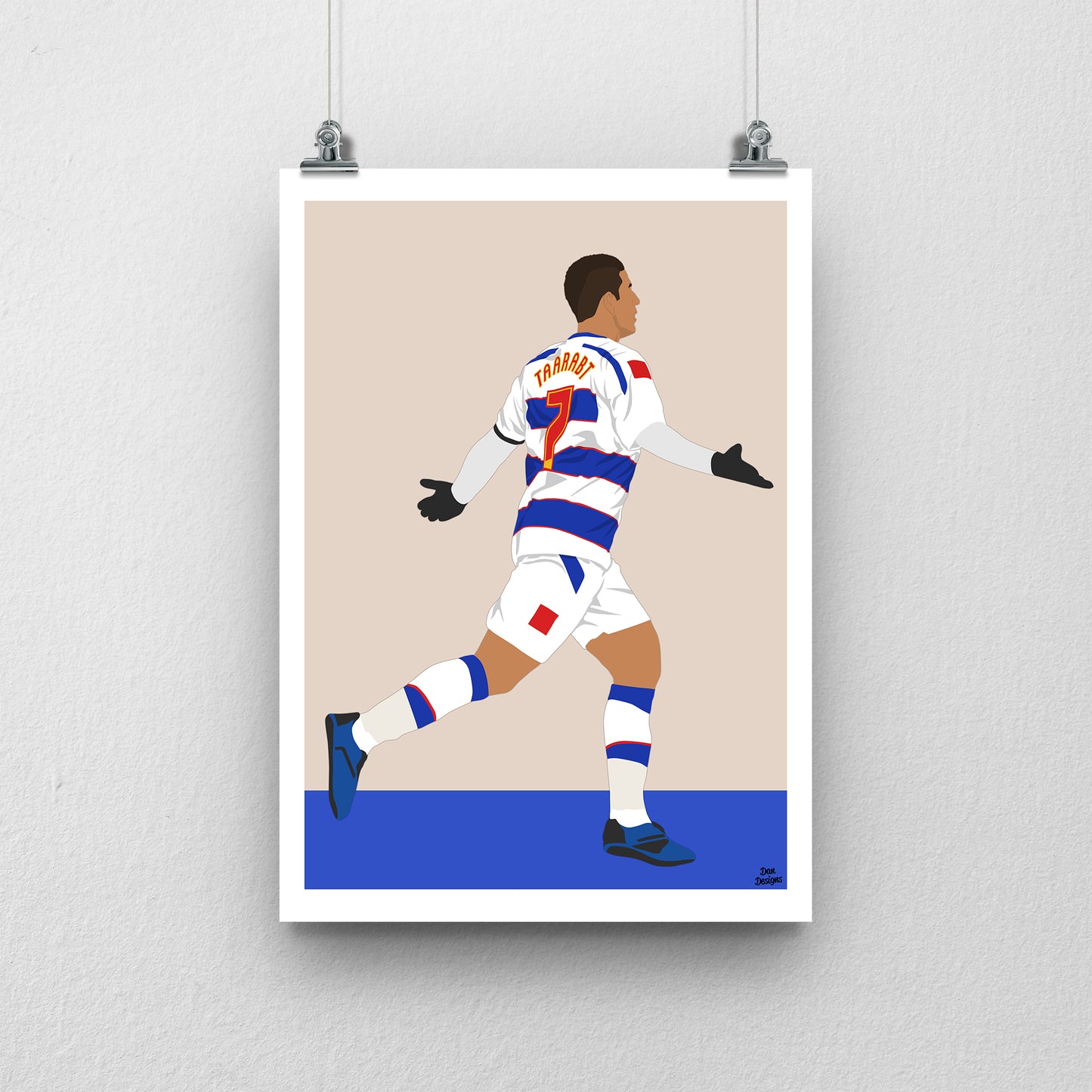 Adel Taarabt QPR art print showing his arms-out celebration in the blue-and-white number 7 kit, with a beige background, white border and blue base.