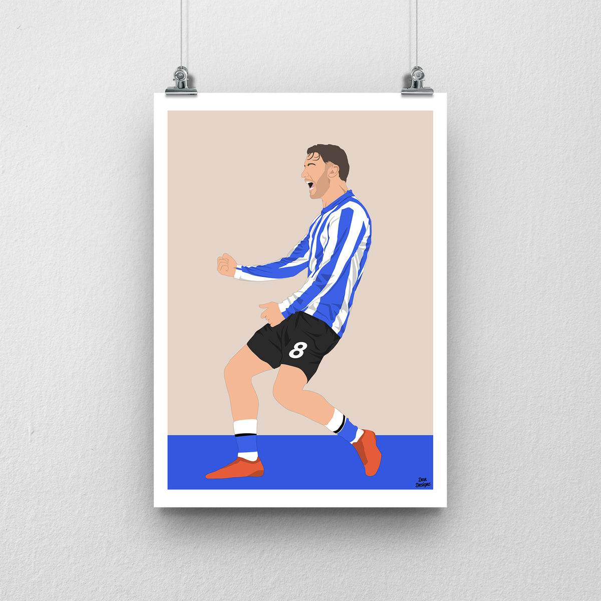 Callum Slattery art print, celebrating with clenched fists in Sheffield Wednesday's blue-and-white striped shirt and black shorts, against a beige background with a white border and blue base.