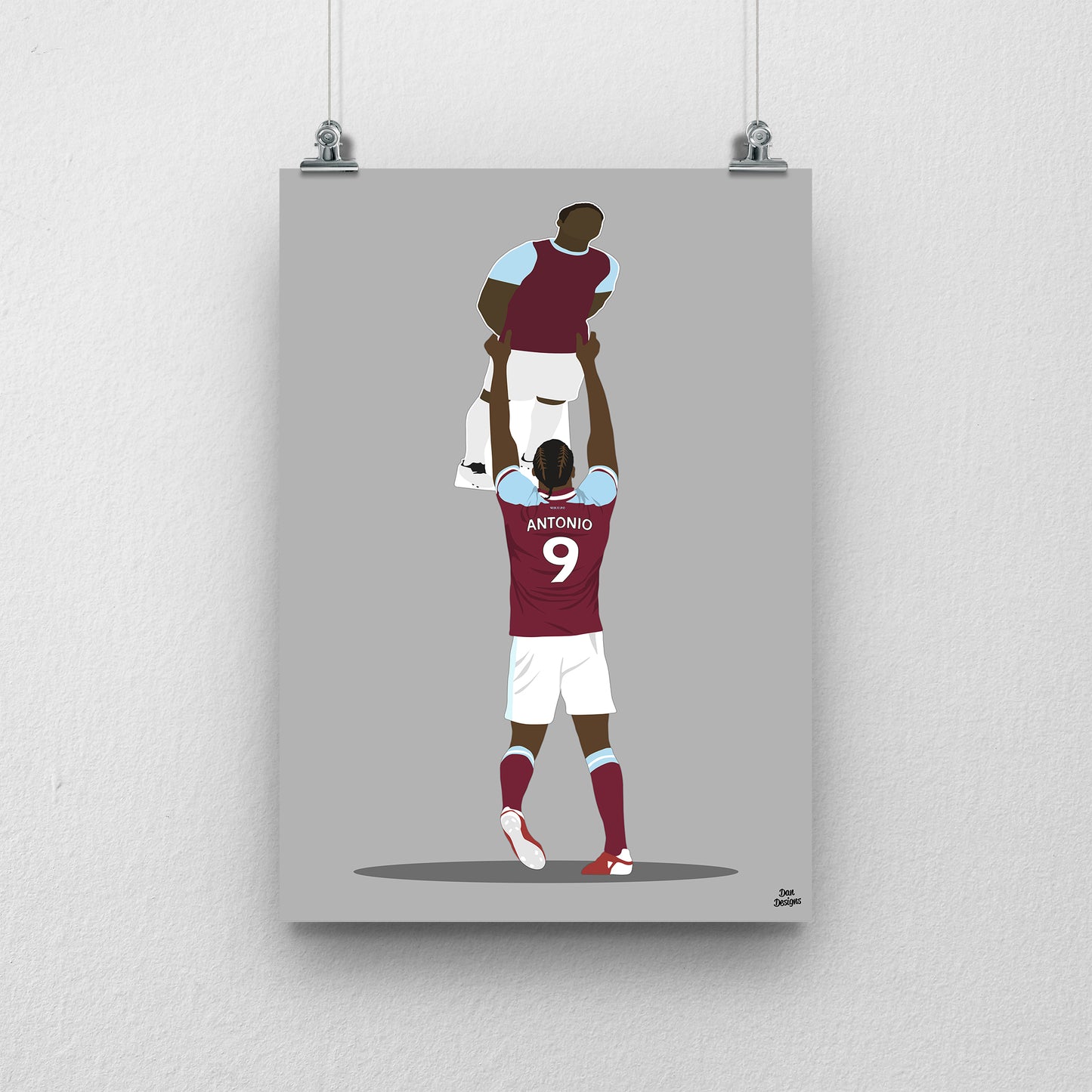 Michail Antonio West Ham United art print, holding a cardboard cut-out of himself above his head in the claret-and-blue kit, with a grey background.