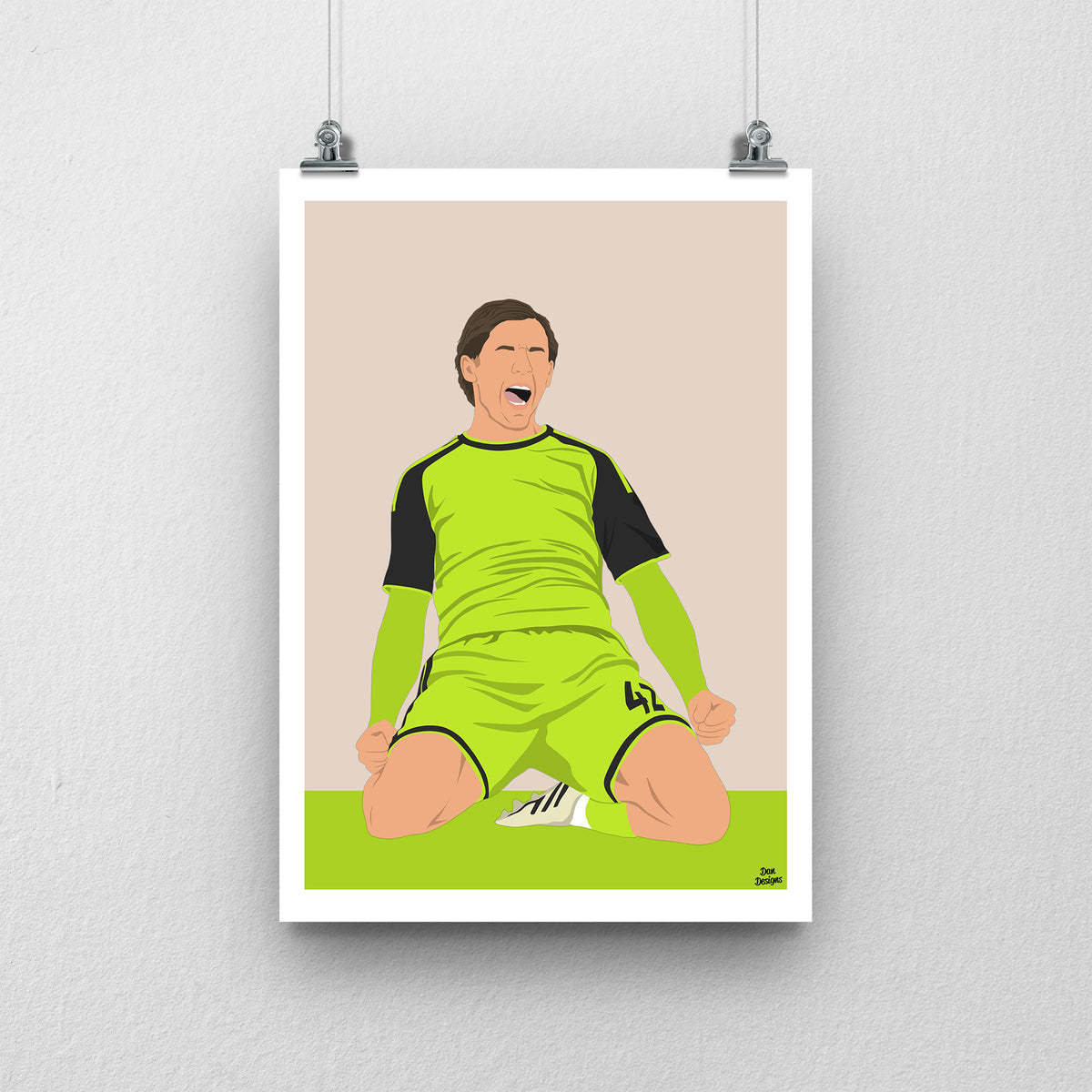 Sydie Peck art print, celebrating on his knees in Sheffield United's bright green kit with black sleeves, against a beige background with a white border and green base.