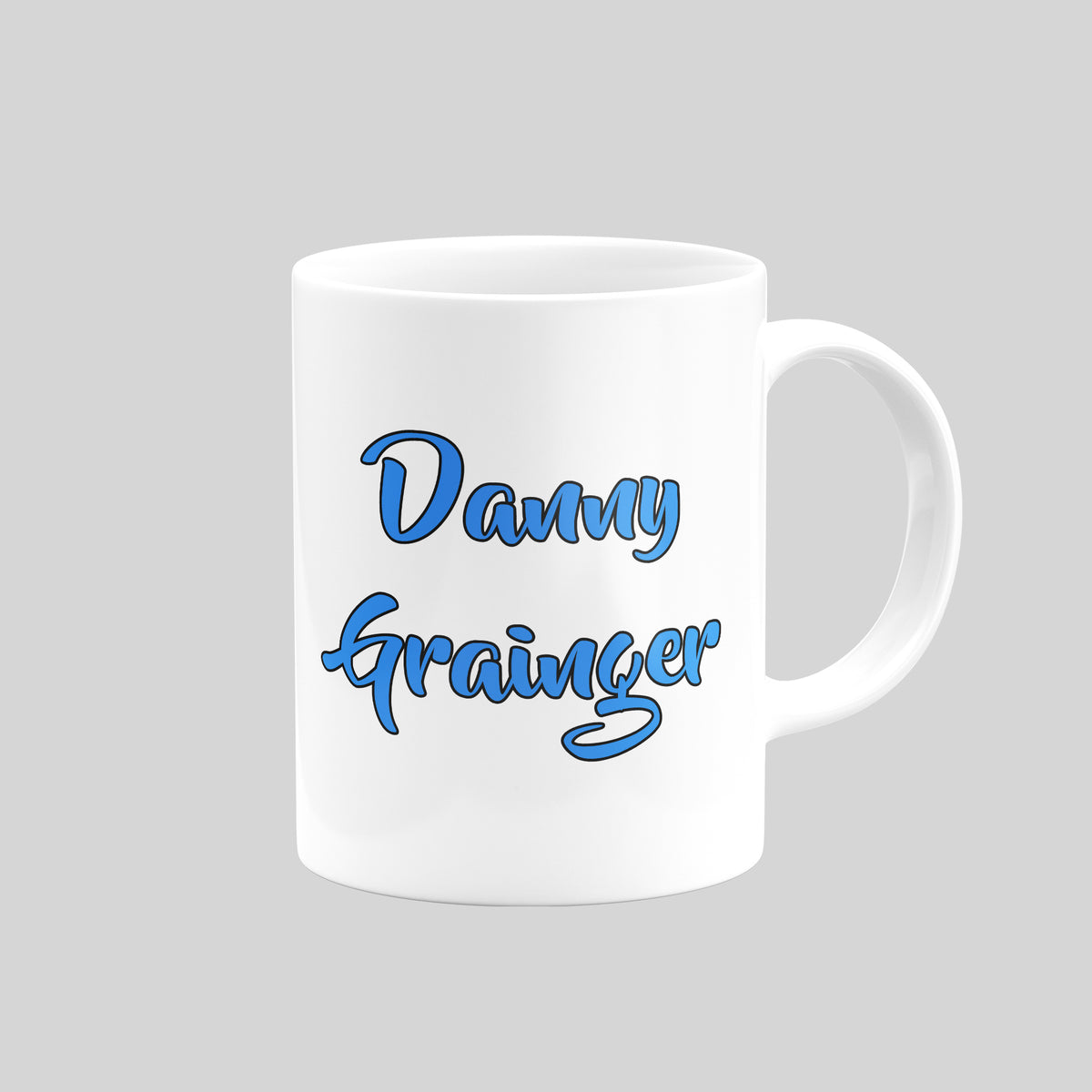 Danny Grainger name design on the reverse of a Carlisle United mug