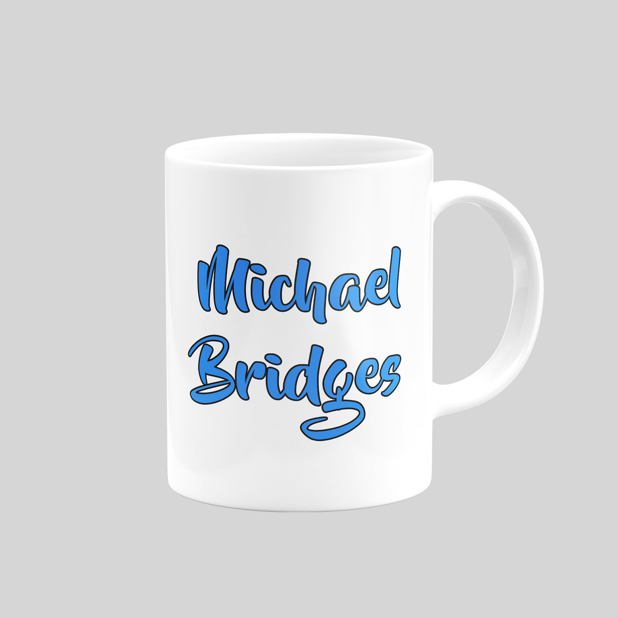 Michael Bridges name design on the reverse of a Carlisle United mug