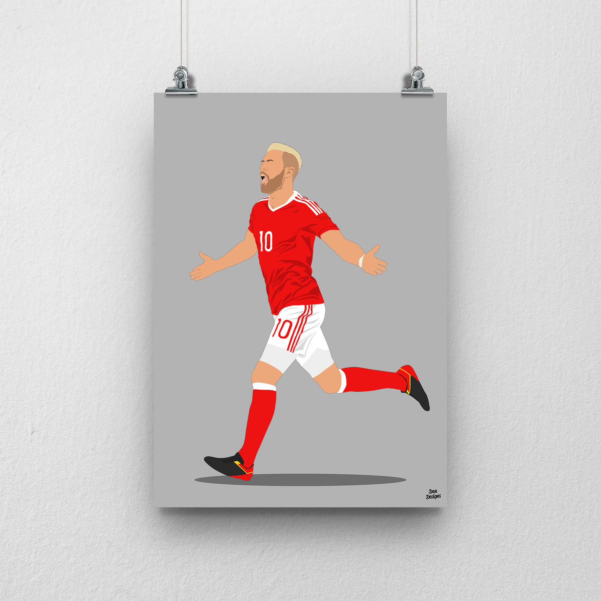 Aaron Ramsey Wales print, running with his arms out in celebration, on a grey background.