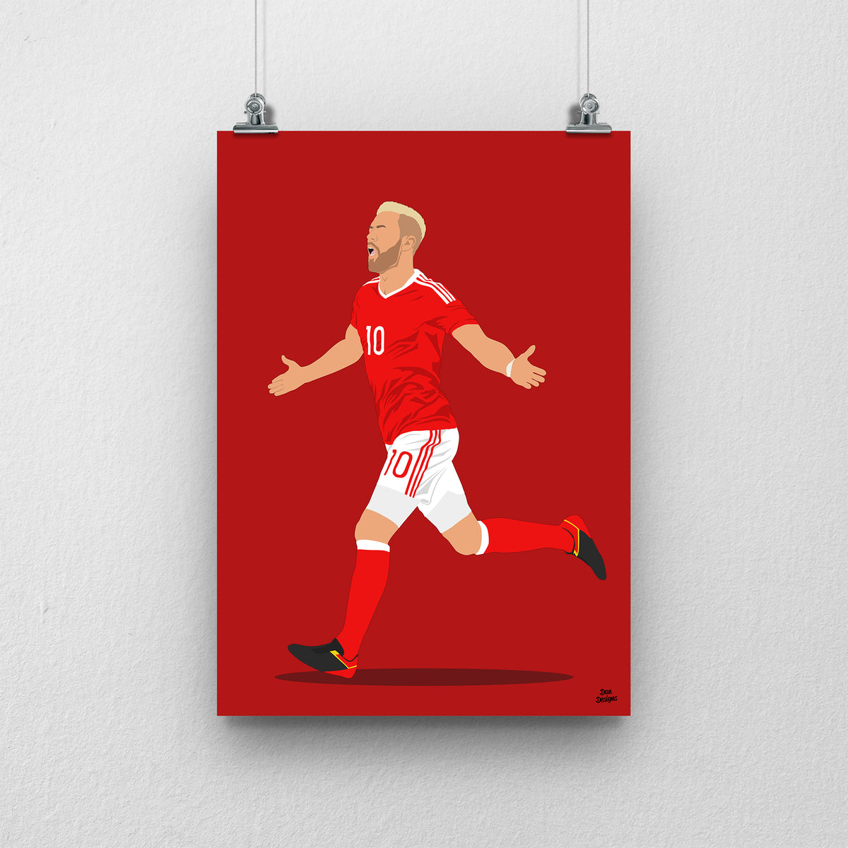 Aaron Ramsey Wales print, running with his arms out in celebration, on a red background.