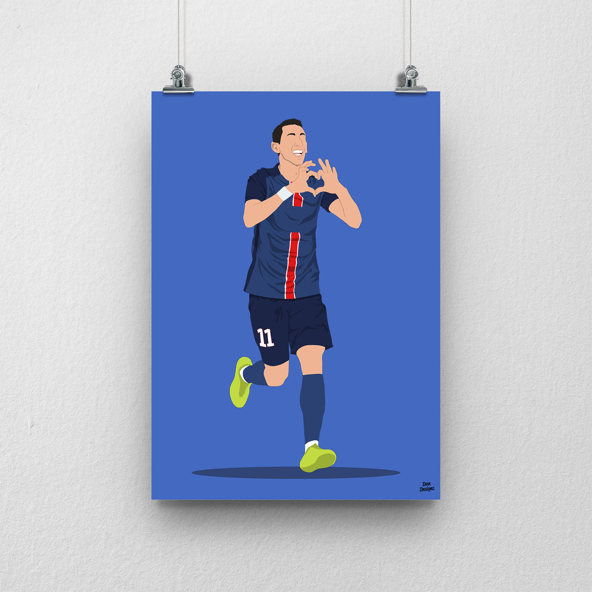 Ángel Di María art print, running in PSG's navy kit and making a heart shape with his hands, against a blue background.