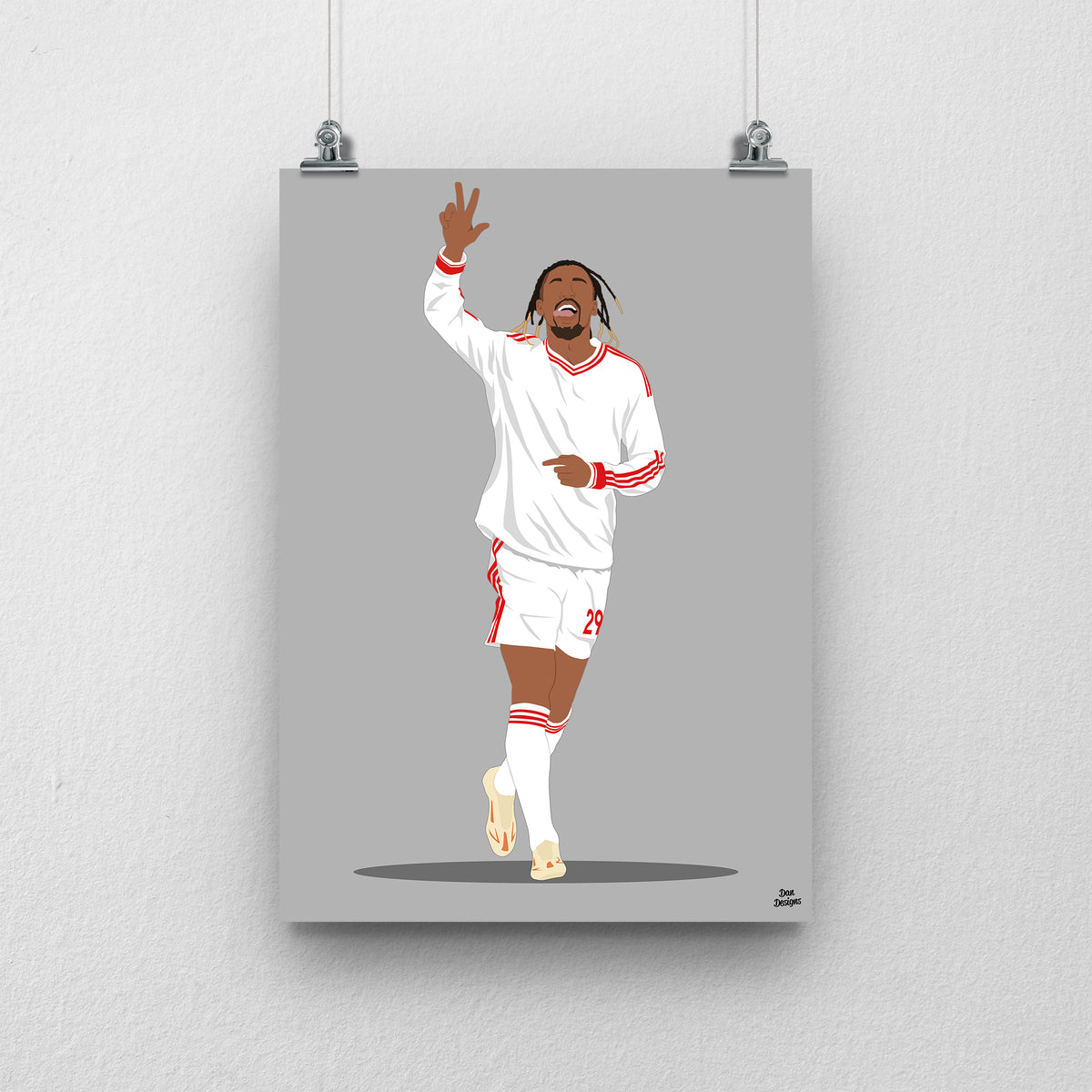 Bradley Barcola Liverpool print, celebrating with one hand raised in the white away kit, on a grey background.