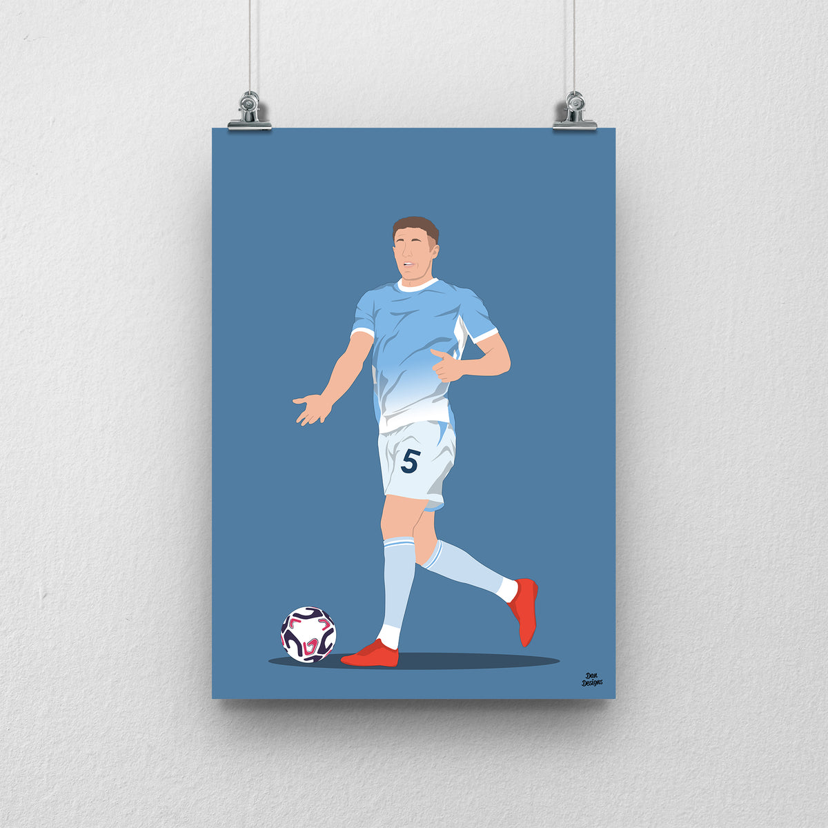 Elliot Anderson art print, with the ball at his feet in Manchester City's sky-blue shirt and number 5 white shorts, against a blue background.