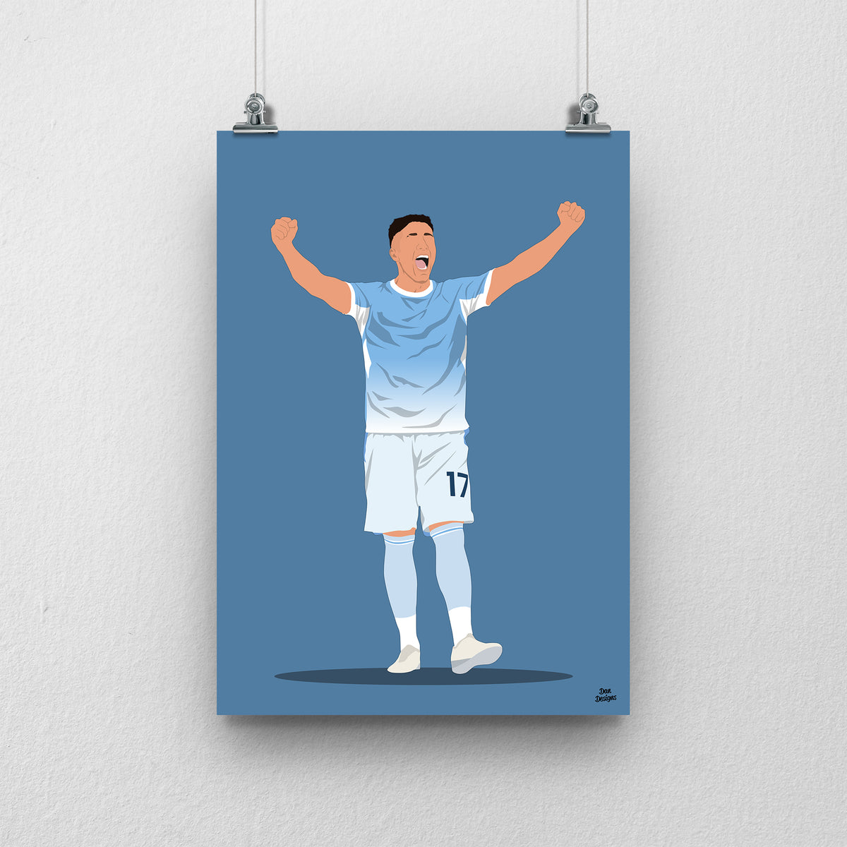Enzo Fernández art print, celebrating with both arms raised in Manchester City's sky-blue shirt and white shorts, against a blue background.