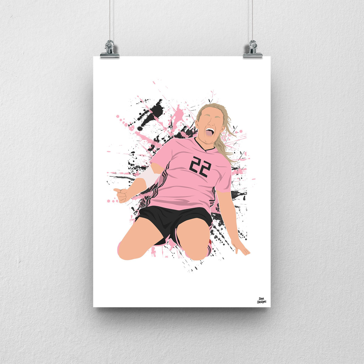 Erin Cuthbert sliding on her knees in Scotland’s pink number 22 shirt, illustrated with pink and black paint splashes on white.