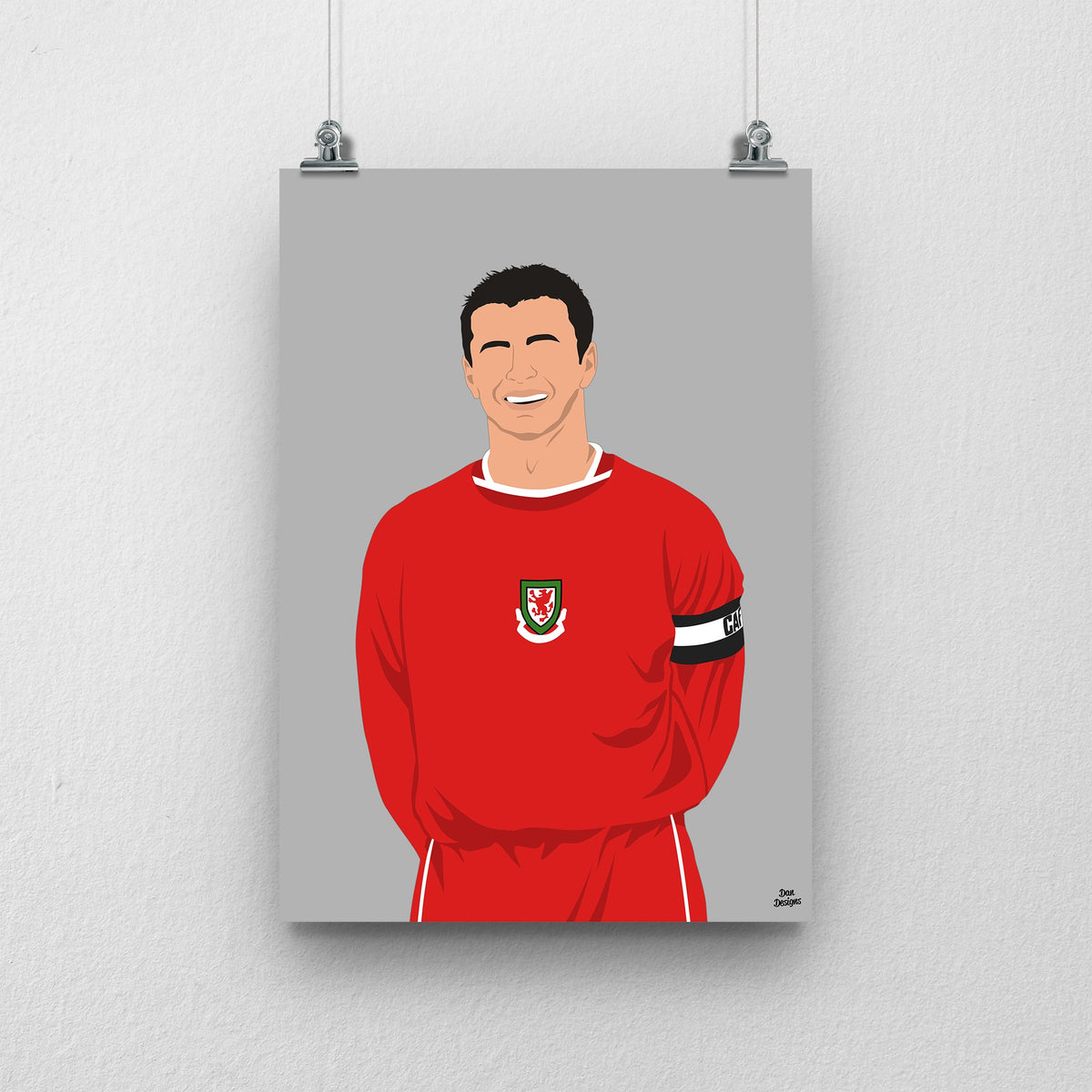 Gary Speed Wales print, smiling in the red Wales shirt with the captain’s armband, on a grey background.