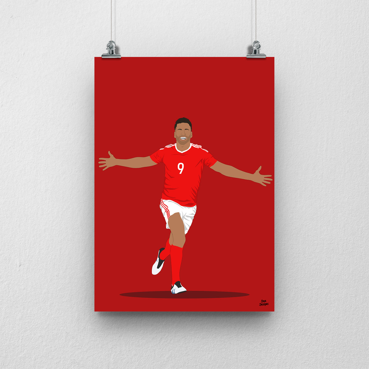 Hal Robson-Kanu Wales print, celebrating with both arms outstretched, on a red background.