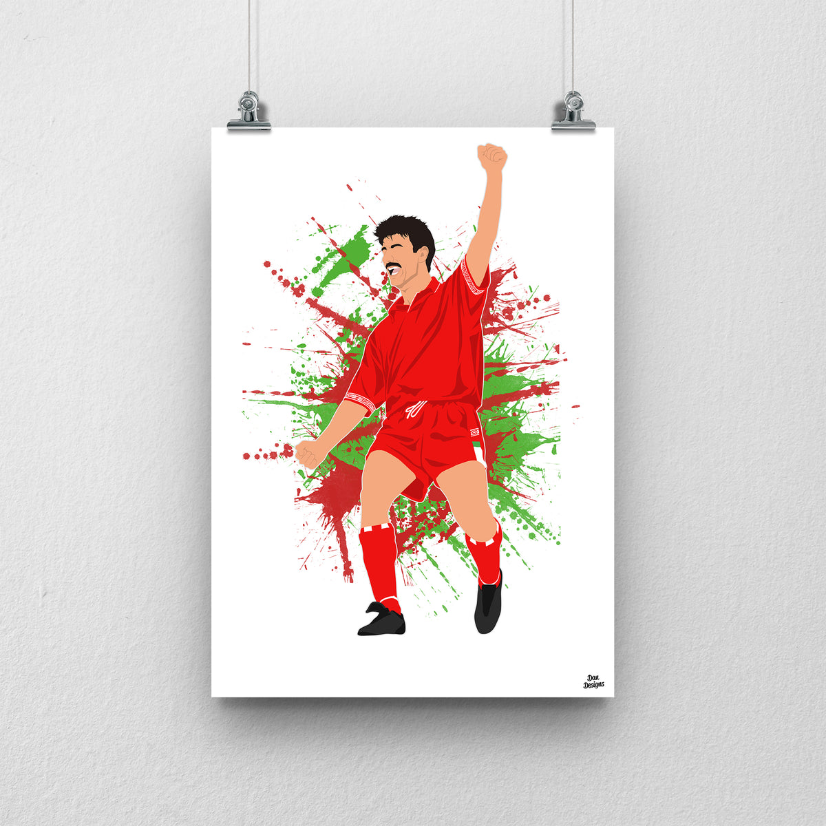 Ian Rush Wales print, celebrating with one arm raised, on a red and green paint-splatter background.