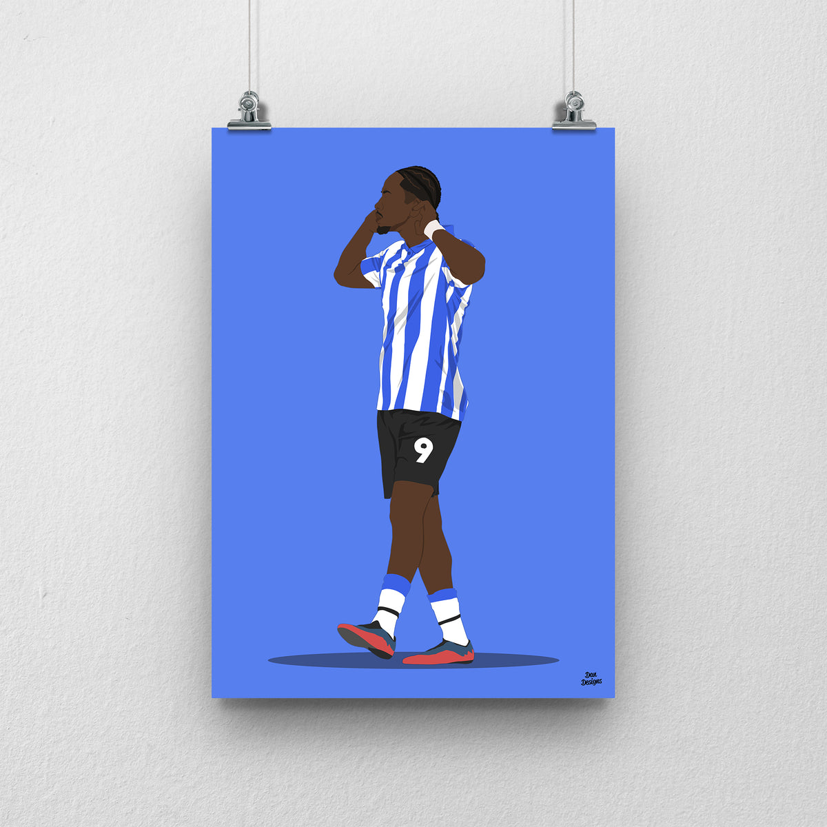 Jamal Lowe art print, holding both hands beside his face in Sheffield Wednesday's blue-and-white striped kit, against a blue background.