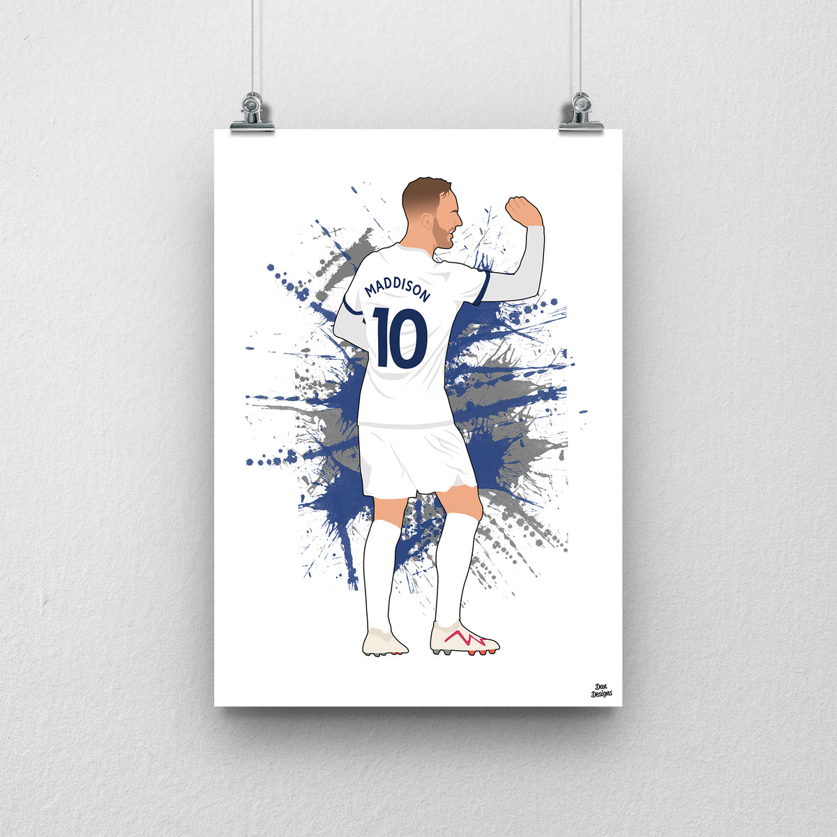 James Maddison Tottenham art print, performing his darts celebration, viewed from behind in his Tottenham number 10 shirt, with a paint-splatter background.
