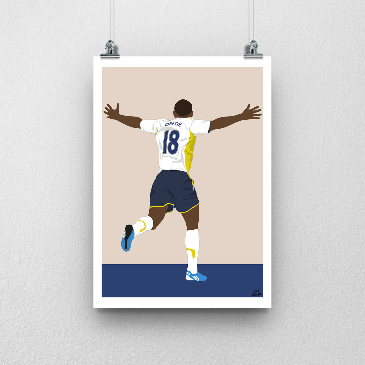 Jermain Defoe Tottenham art print, running with both arms spread, viewed from behind in his Tottenham number 18 shirt, with a beige background, white border and club-colour base.