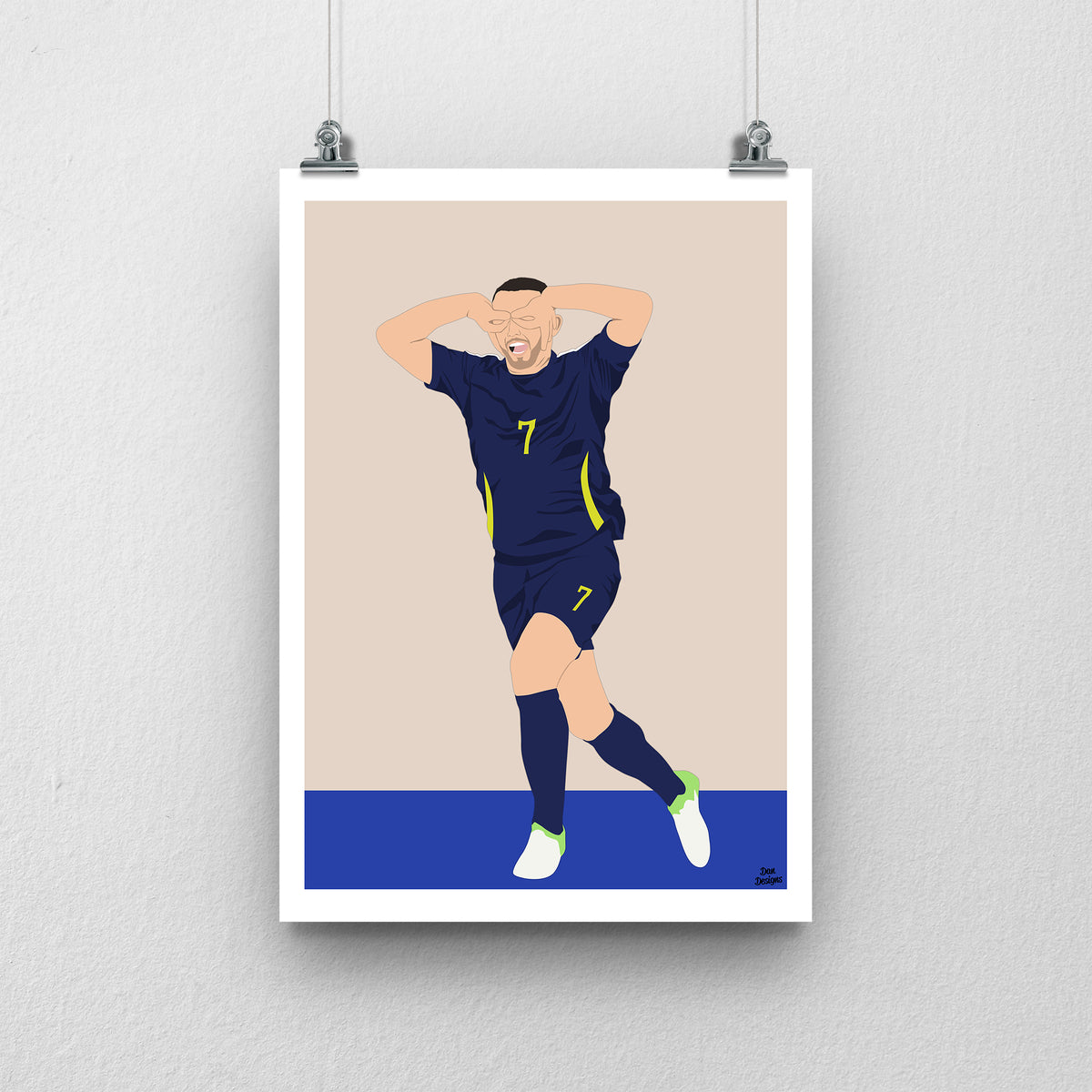 John McGinn celebrating with his hands around his eyes in Scotland’s navy number 7 kit, illustrated with a beige background, blue base and white border.