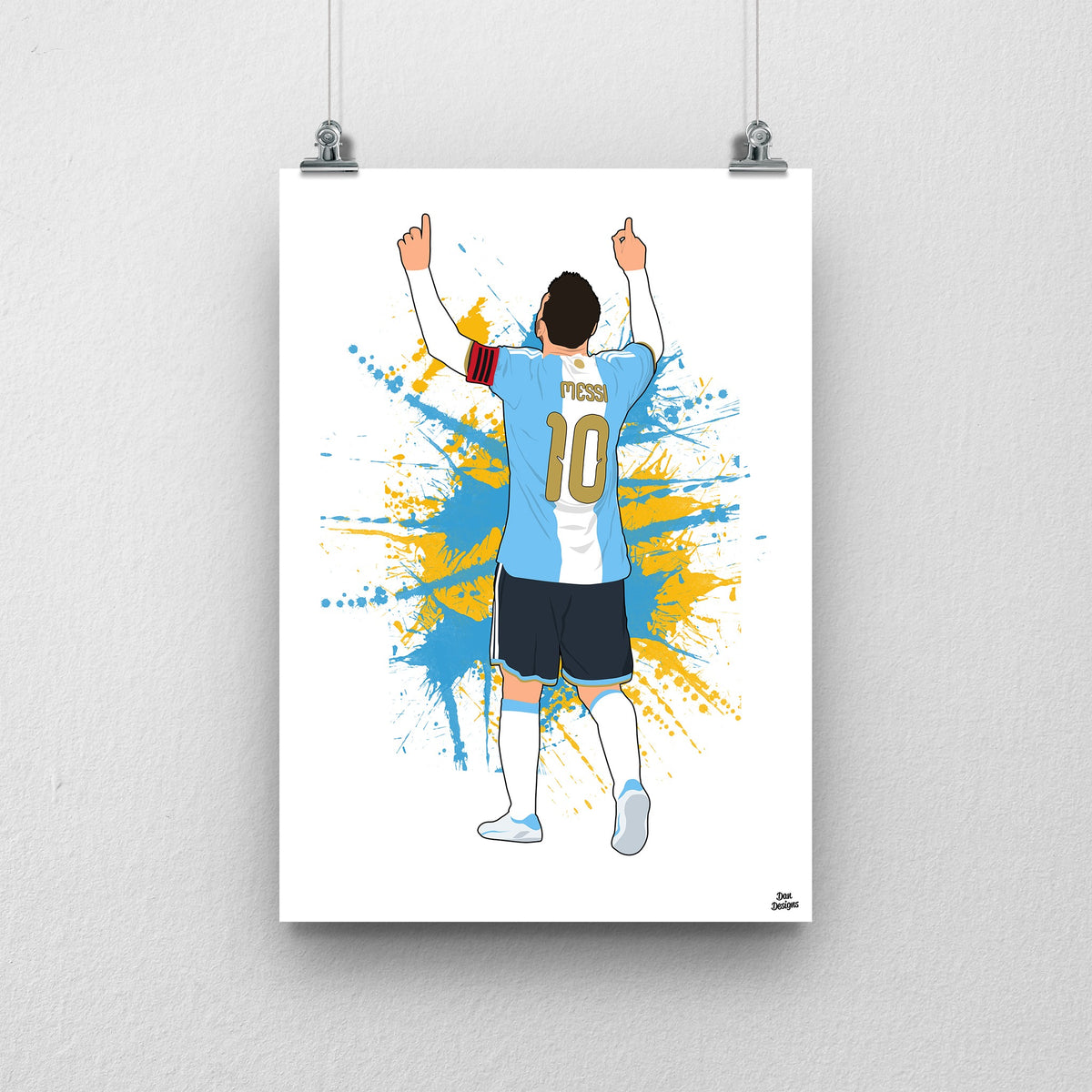 Lionel Messi Argentina farewell print, with both hands pointing skywards and a blue and gold paint-splatter background.