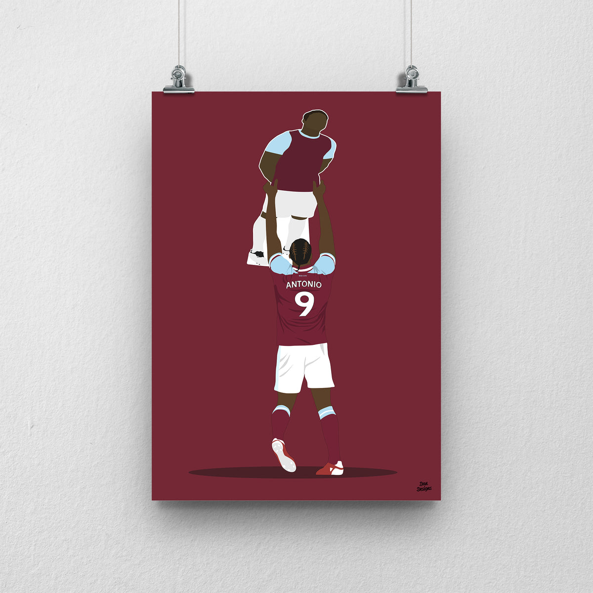 Michail Antonio West Ham United art print, holding a cardboard cut-out of himself above his head in the claret-and-blue kit, with a claret background.