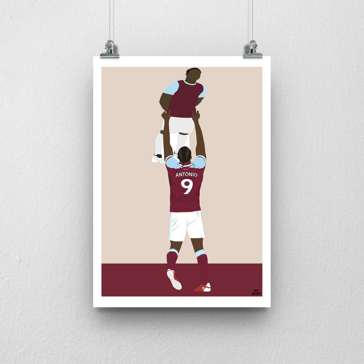 Michail Antonio West Ham United art print, holding a cardboard cut-out of himself above his head in the claret-and-blue kit, with a beige background, white border and club-colour base.