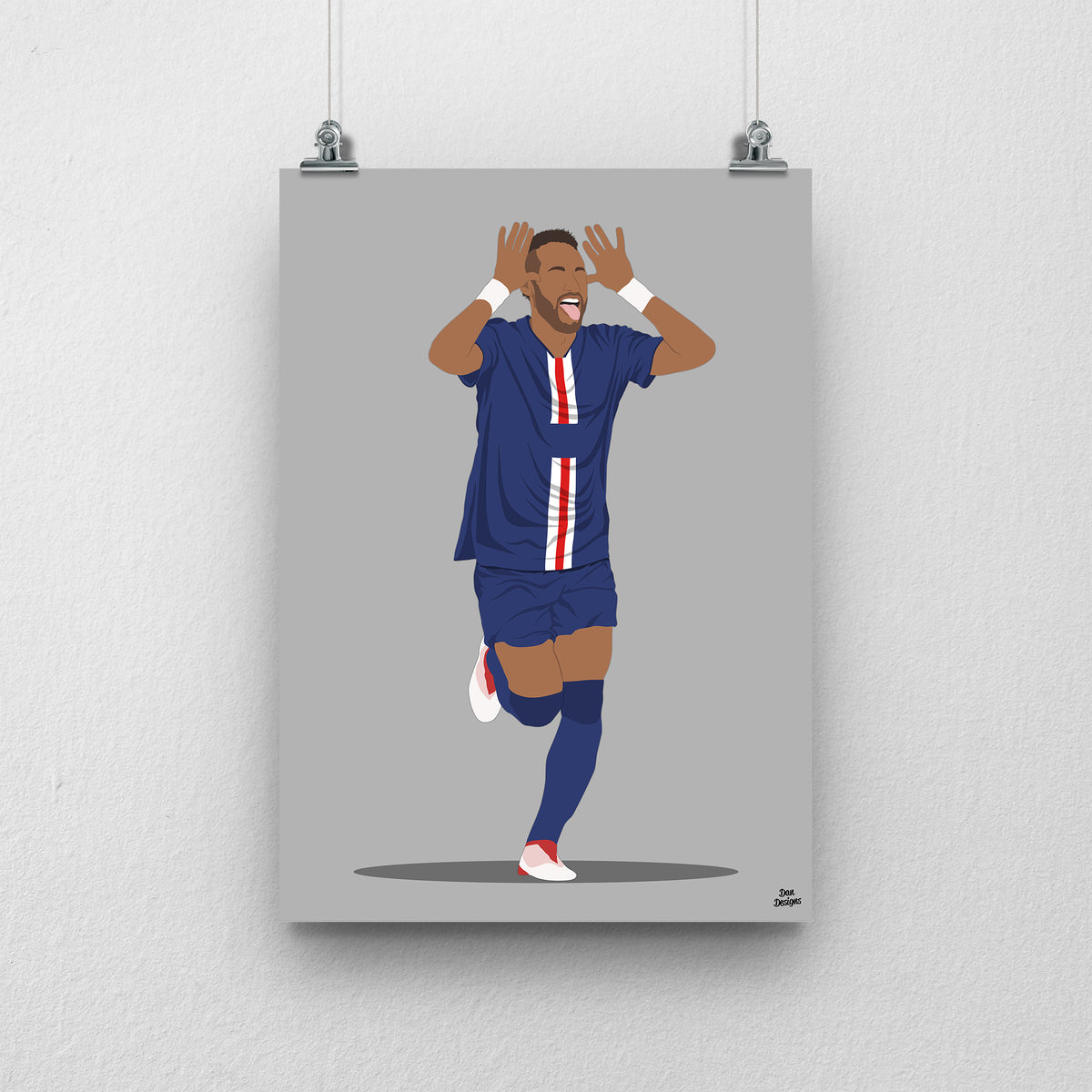 Neymar running in a navy PSG kit with both hands raised beside his head, against a grey background.