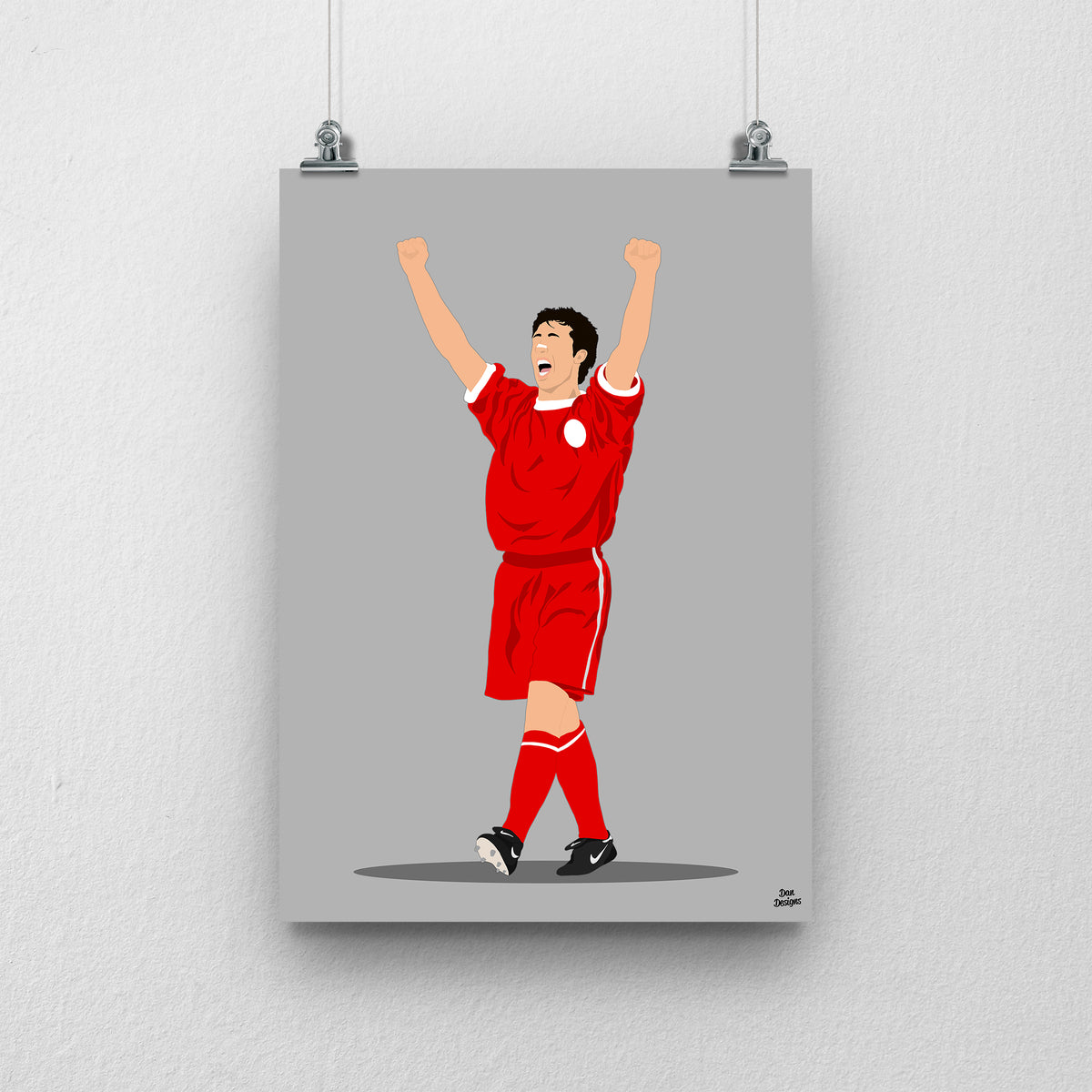 Robbie Fowler Liverpool print, celebrating with both arms raised in the red Liverpool kit, on a grey background.