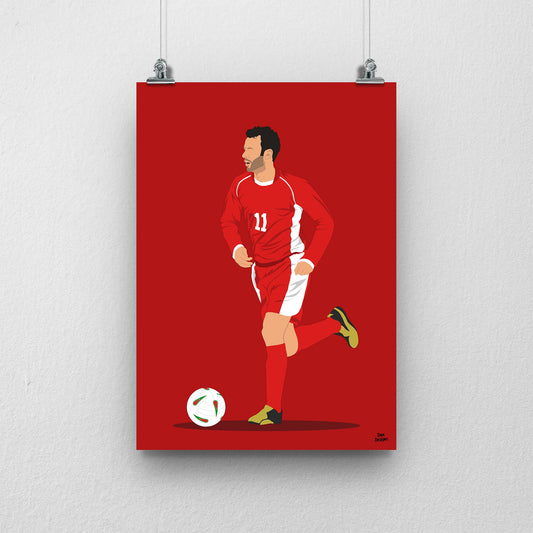 Ryan Giggs Wales print, running with the ball in the red Wales number 11 kit, on a red background.