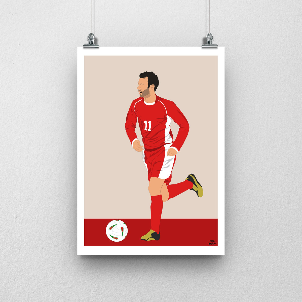 Ryan Giggs Wales print, running with the ball in the red Wales number 11 kit, with a beige-and-red design and white border.