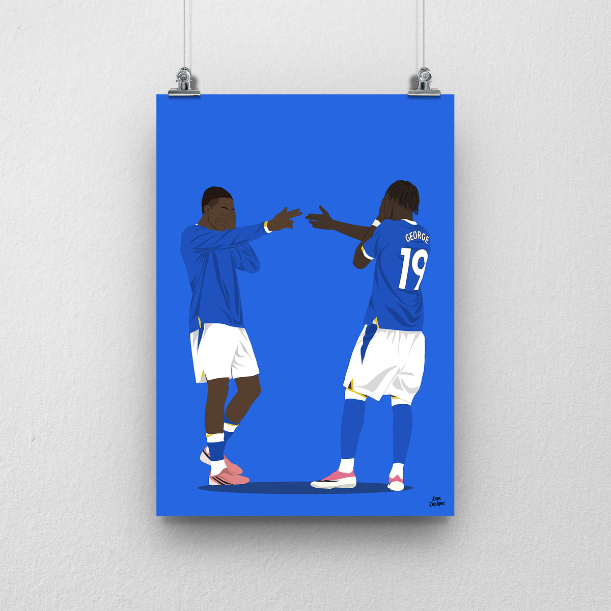 Thierno Barry and Tyrique George Everton print, celebrating together in blue Everton shirts, on a blue background.